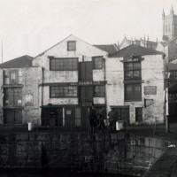 Across from the wet dock