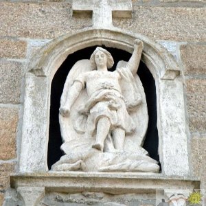 Sculpture of St Michael the Archangel at rear of Church