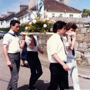 Young Male Parishioners carry Our Lady's Float