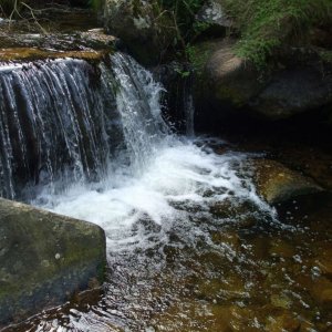 The stream and waterfall at Portheras Cove