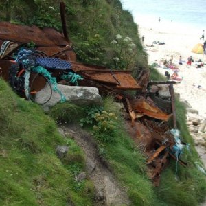 The remains of HMS Alacrity on the cliffside, Portheras Cove