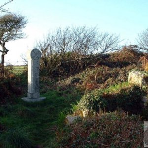 Modern cross and ancient chapel near Sancreed Well