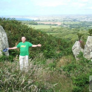 Phil by Trencrom Fort's Gateway with Hayle and Gwithian in the Distance