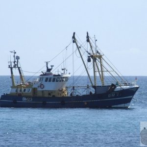 Brixham Trawler entering Penzance harbour.