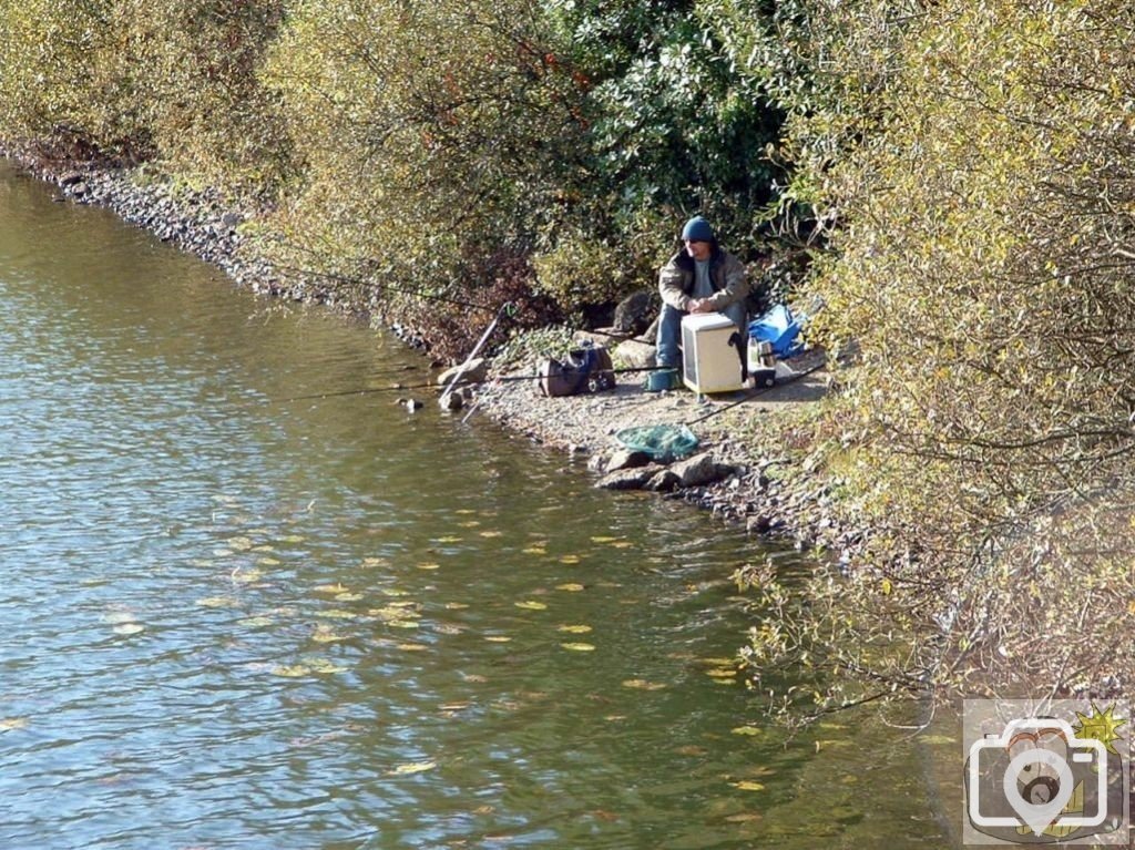 A lone fisherman at Boscathnoe Reservoir