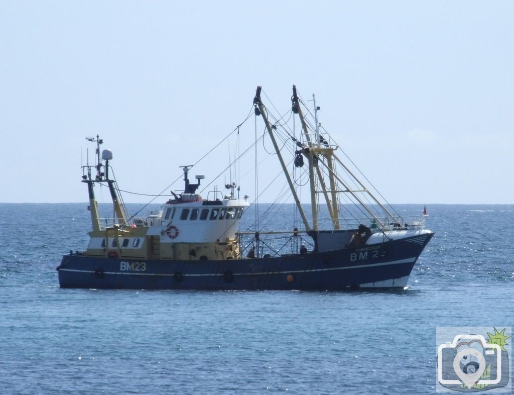 Brixham Trawler entering Penzance harbour.