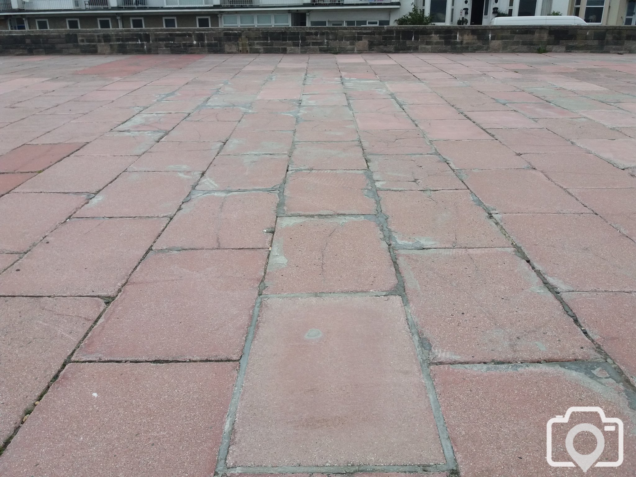 Cracked tiles promenade Penzance