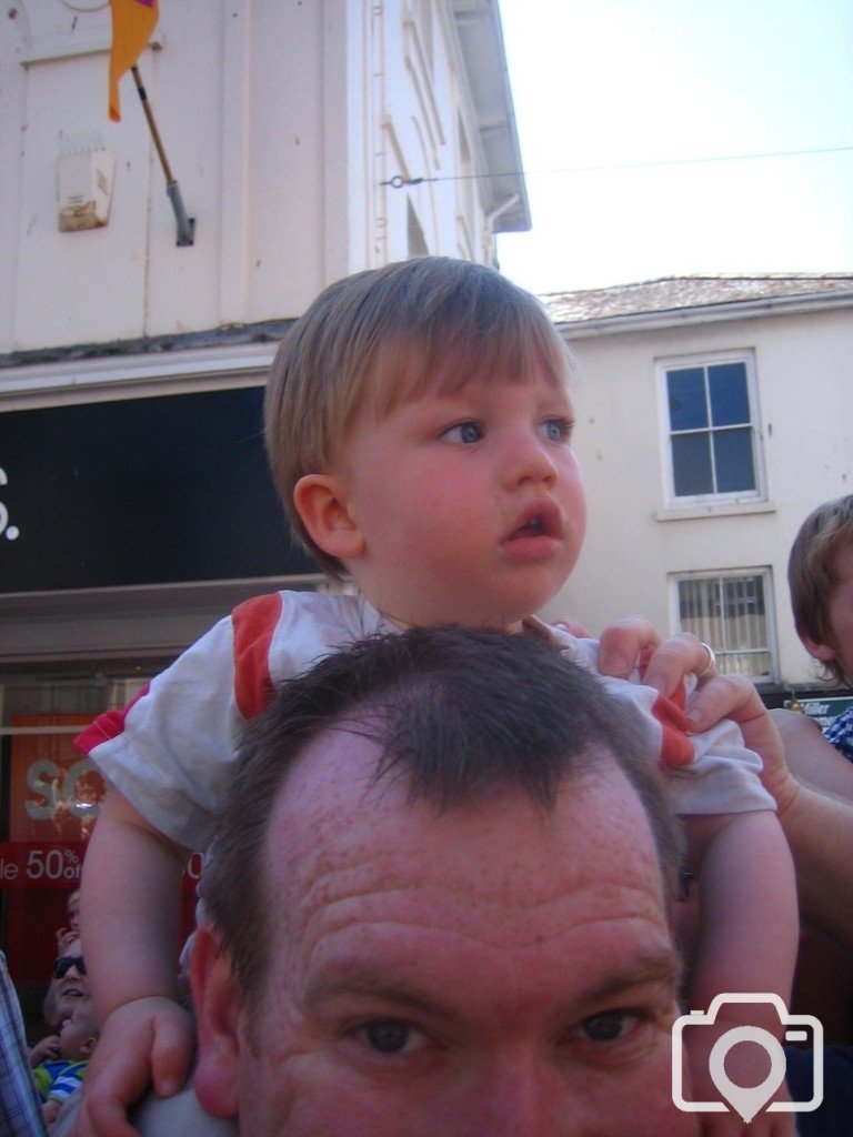 Denanmor and son enjoy the parade