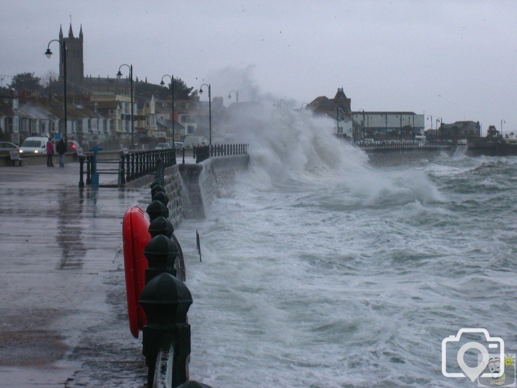 Large waves batter the prom
