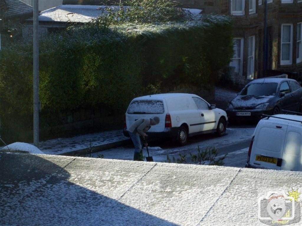 Man trying to clear the top of Barwis Hill of ice - 8th Jan, 2010