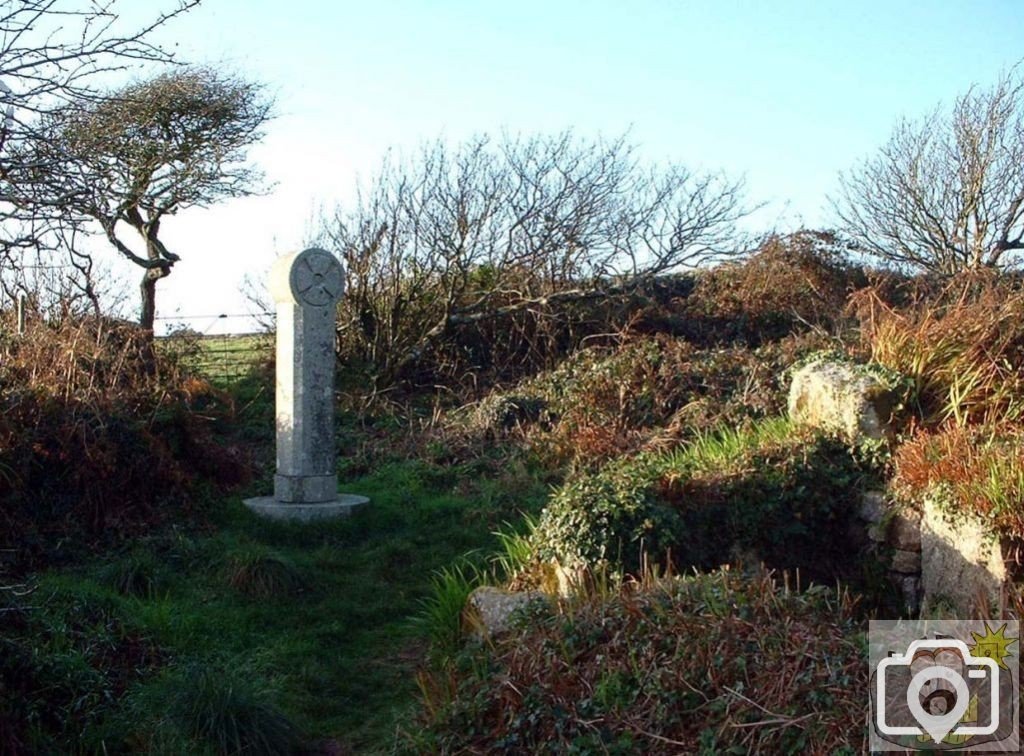 Modern cross and ancient chapel near Sancreed Well