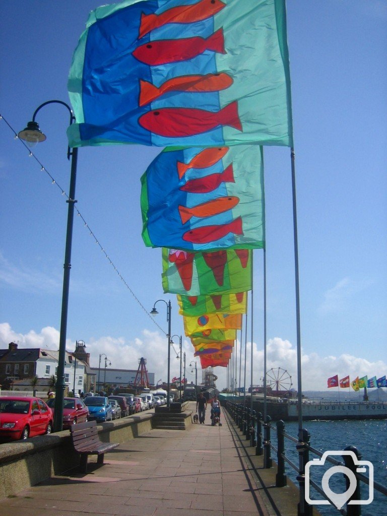 More flags flying on the prom