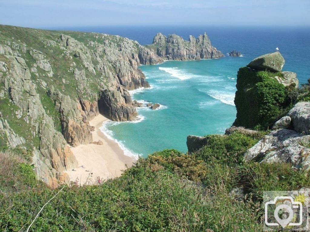 Pedn Vounder with Treryn Dinas and Logan Rock in background