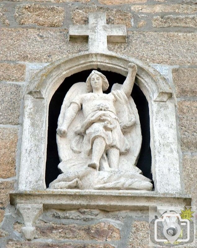 Sculpture of St Michael the Archangel at rear of Church