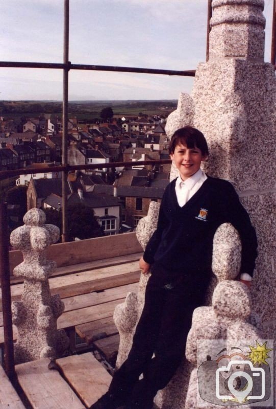 Son at top of R.C. Church