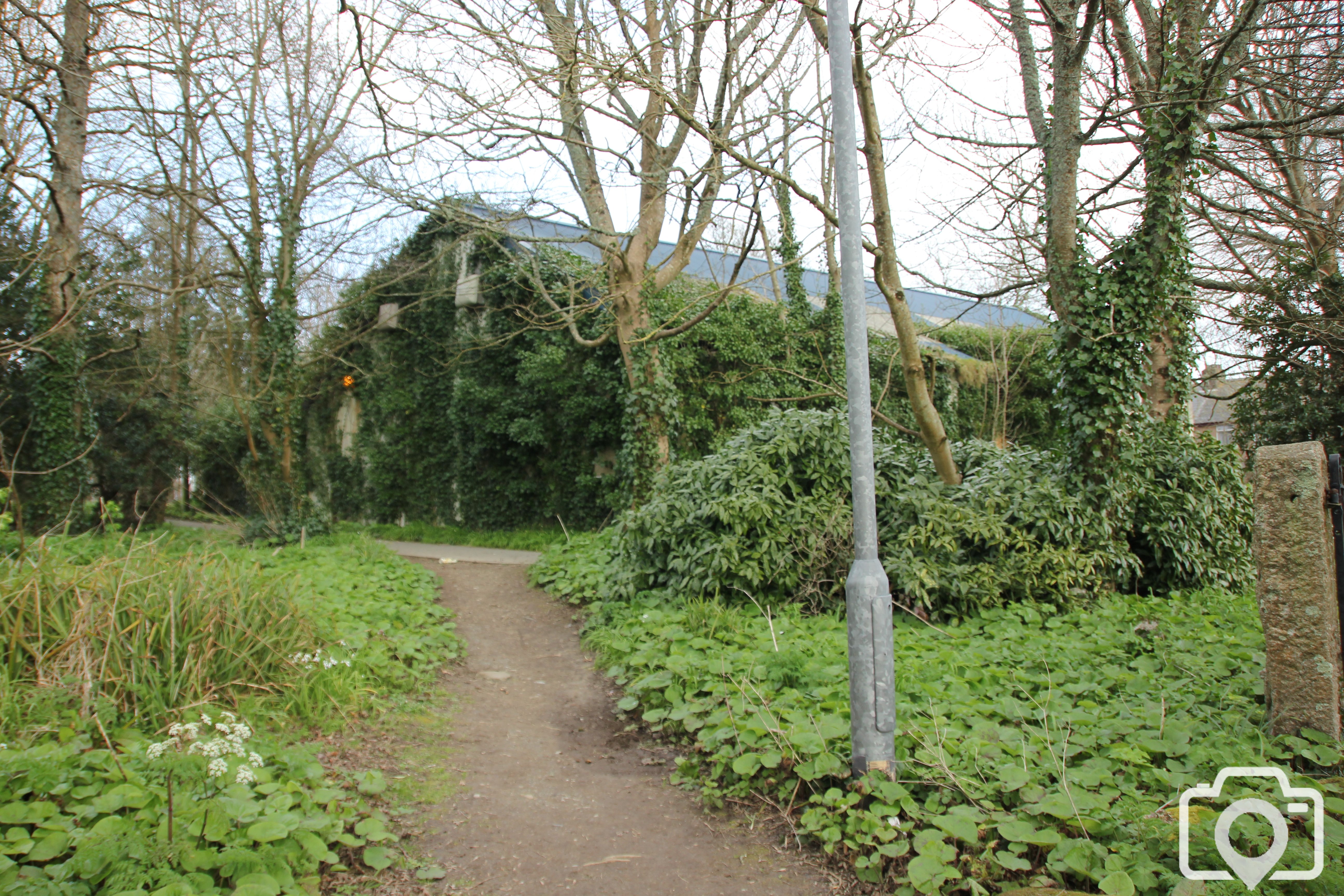 The pathway to the failed indoor swimming pool