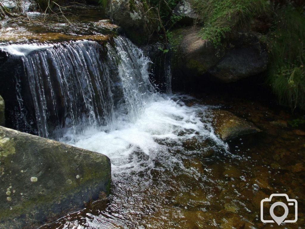 The stream and waterfall at Portheras Cove