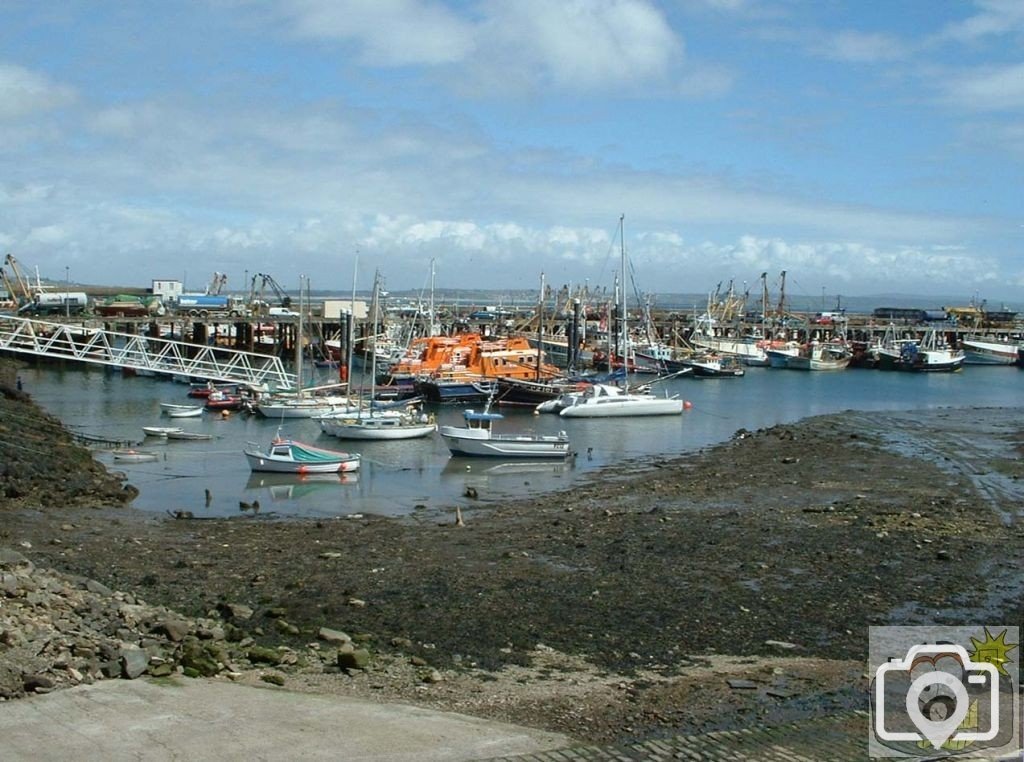 View of lifeboats and busy North Pier